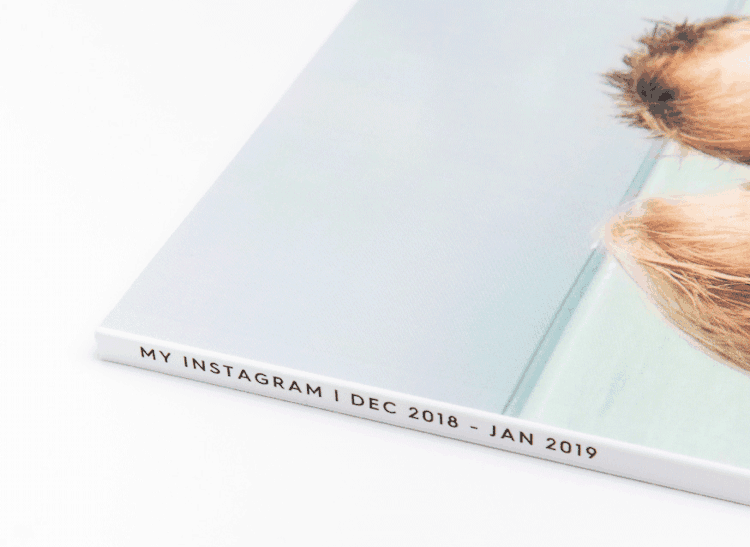 Instagram photo books stacking and unstacking in gif with couple on the covers
