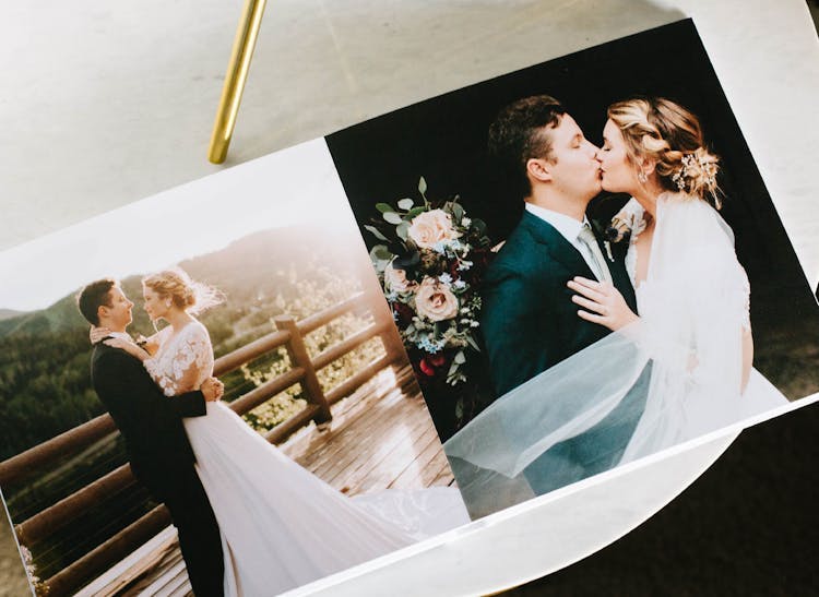 layflat photo album showing couple kissing on wedding day